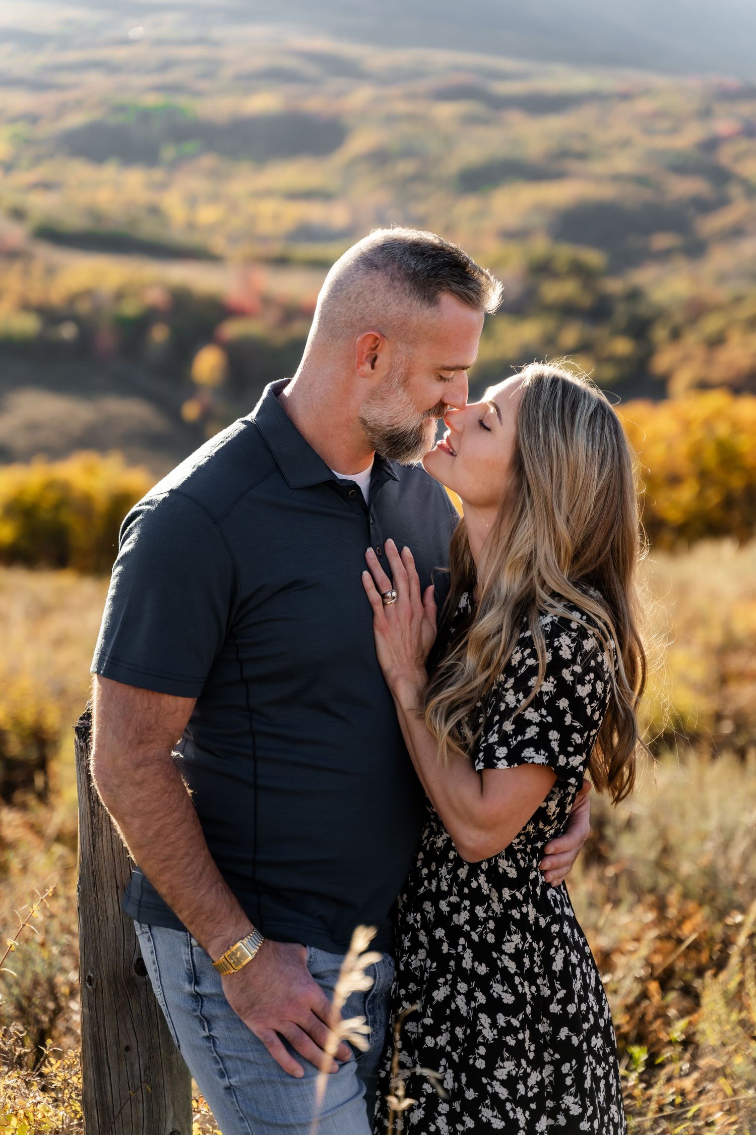 Engagement session at Snow Basin resort at sunset. Rolling hills.  Northern Utah Photographer