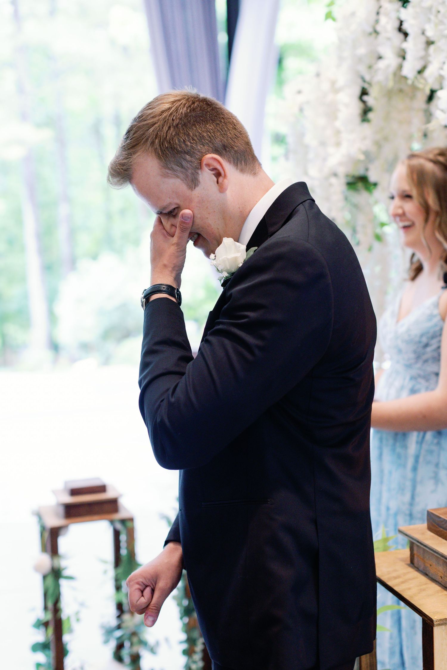 Emotional wedding sequence showing reactions during ceremony in bright indoor venue.
