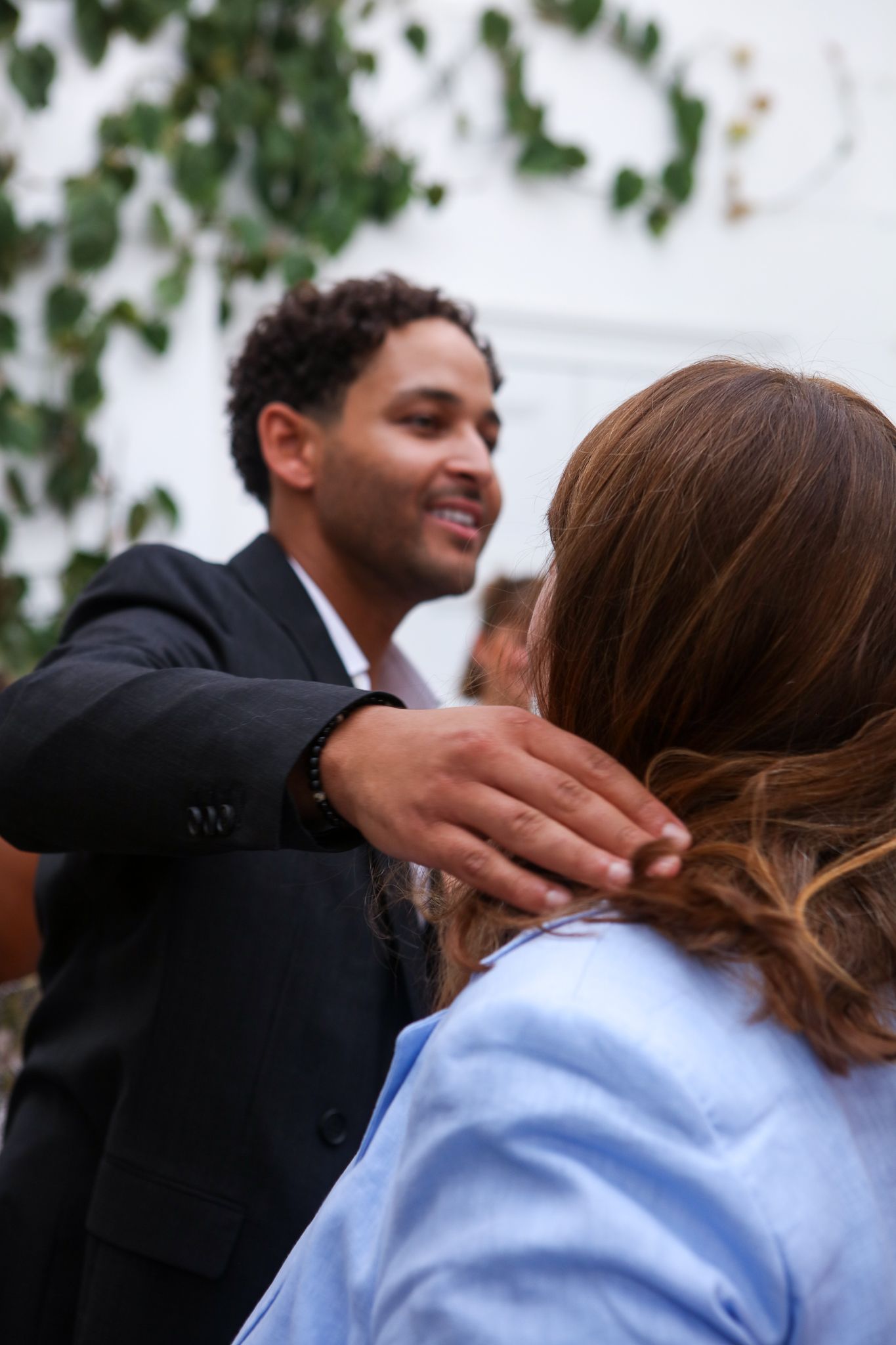 Event photography, candids. people hugging