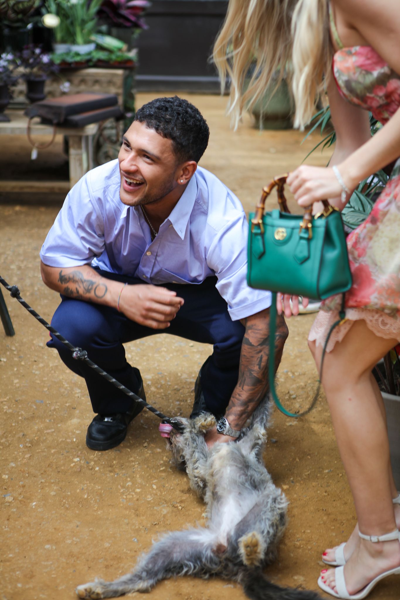 Event photography, candids. people hugging, dog