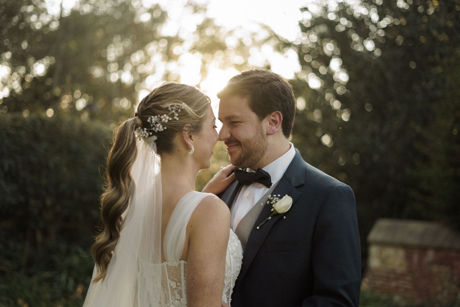 Intimate couple’s portrait surrounded by nature—perfect for outdoor wedding inspiration.
