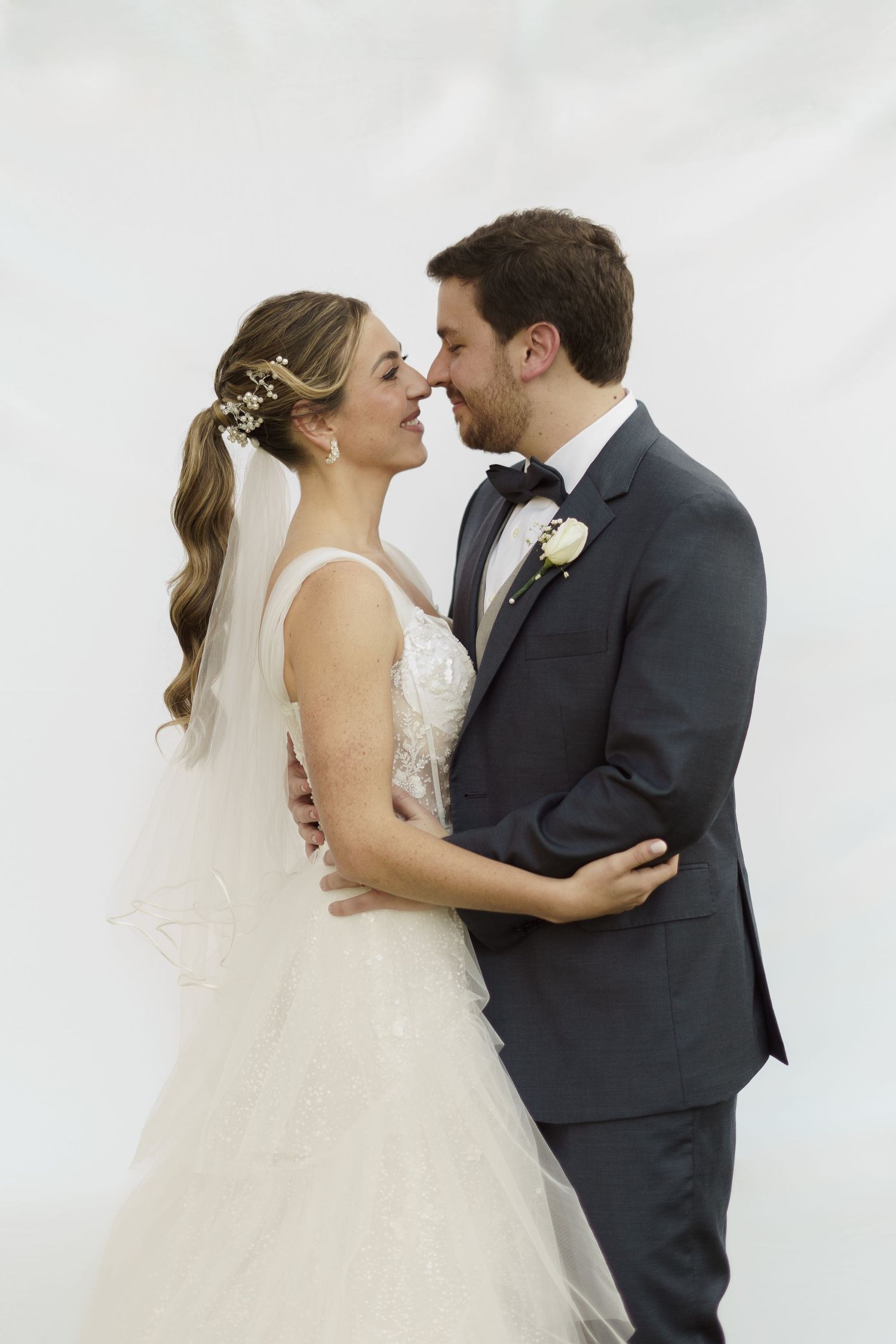 Timeless editorial portrait of the bride and groom for luxury destination weddings.