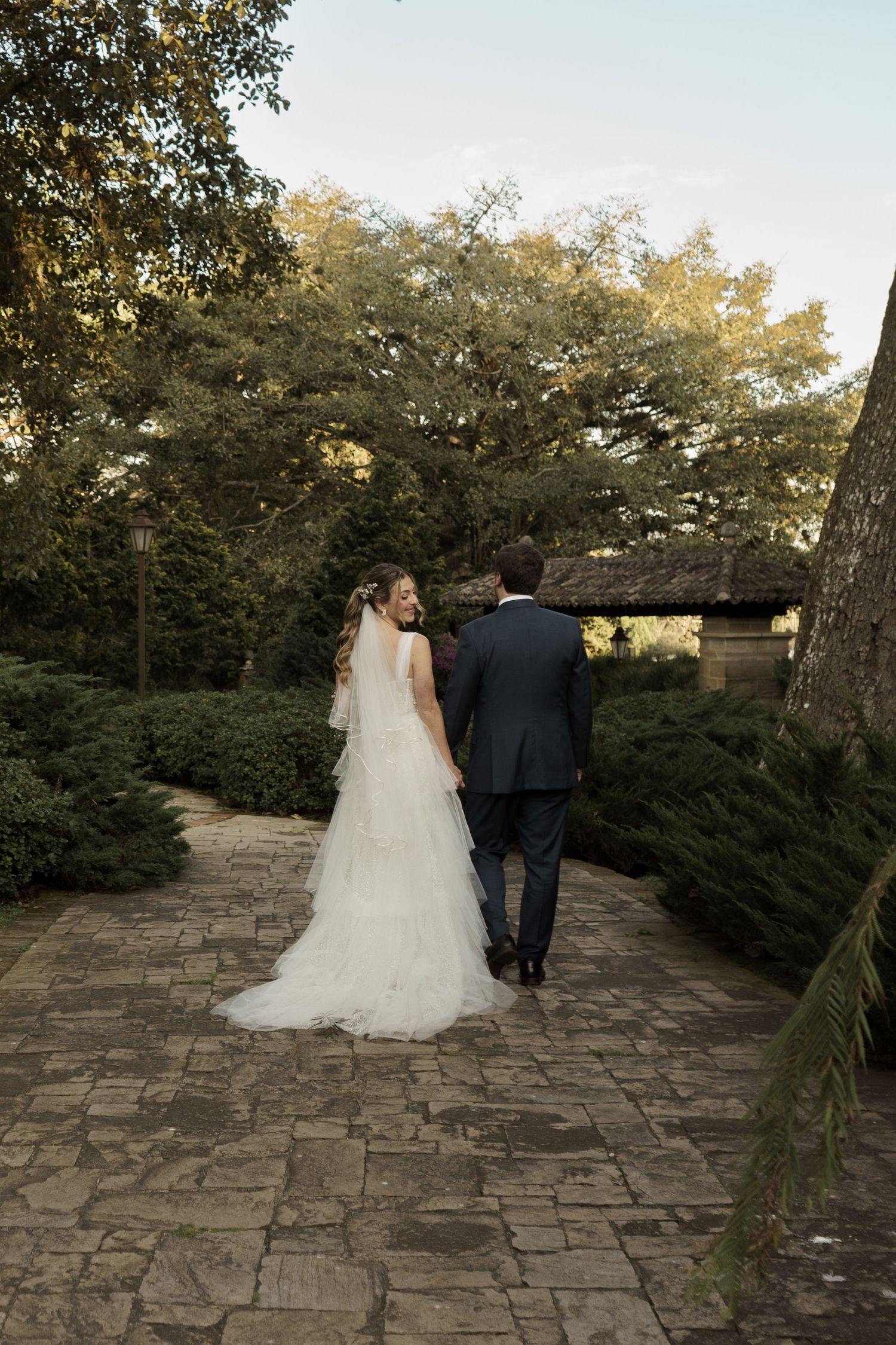 Intimate couple’s portrait surrounded by nature—perfect for outdoor wedding inspiration.