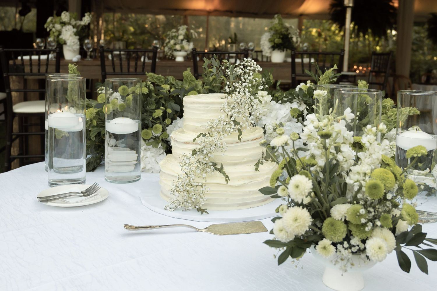 Editorial-style reception details for a luxury wedding dinner setting.