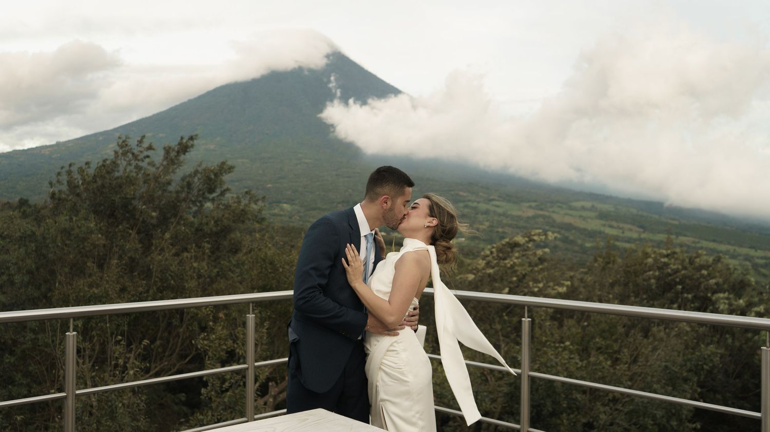Romantic wedding couple captured in soft natural light with an elegant, refined look.