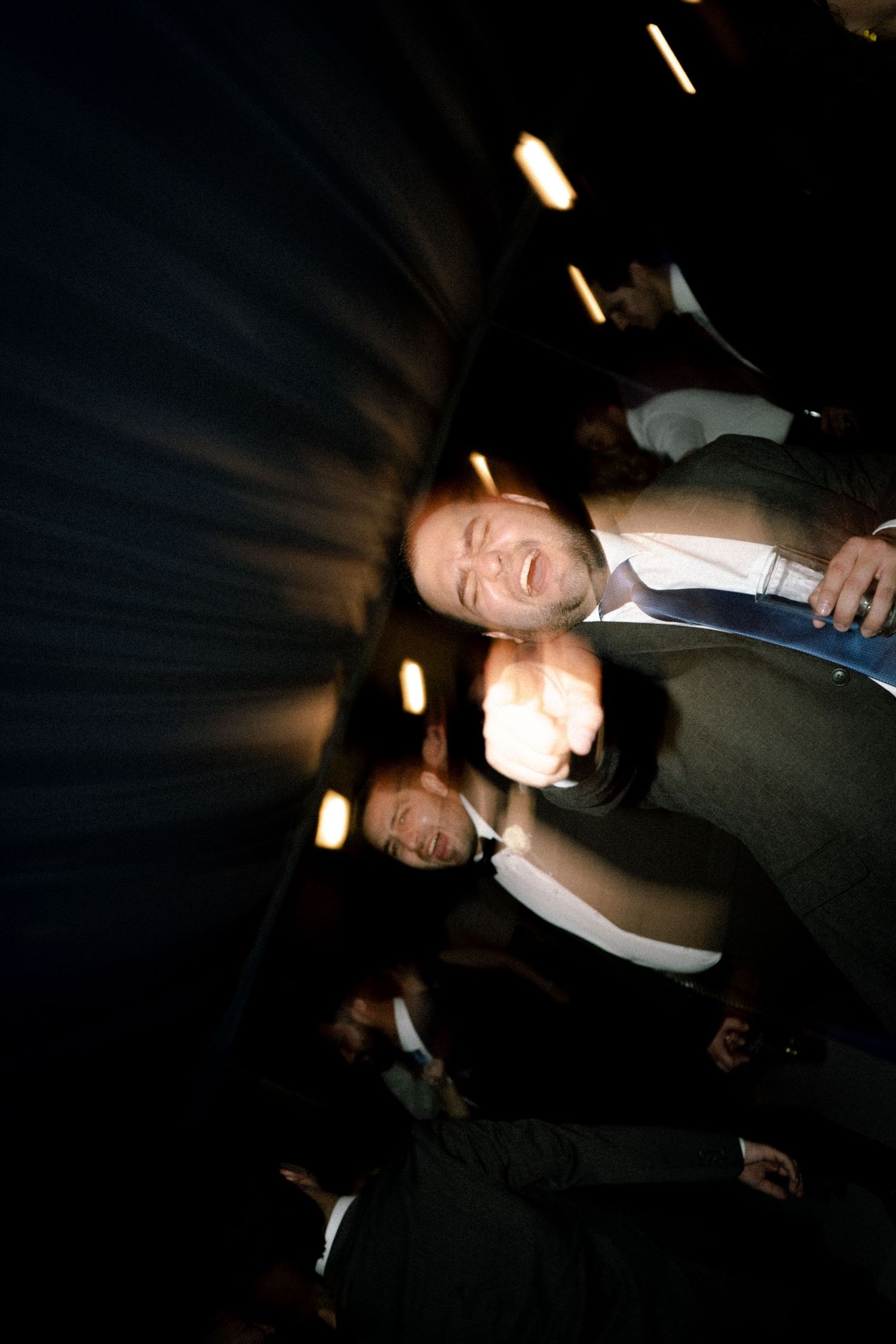 Joyful wedding reception captured with documentary and editorial wedding photography