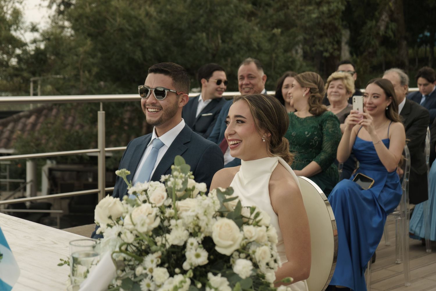 Romantic wedding couple captured in soft natural light with an elegant, refined look.