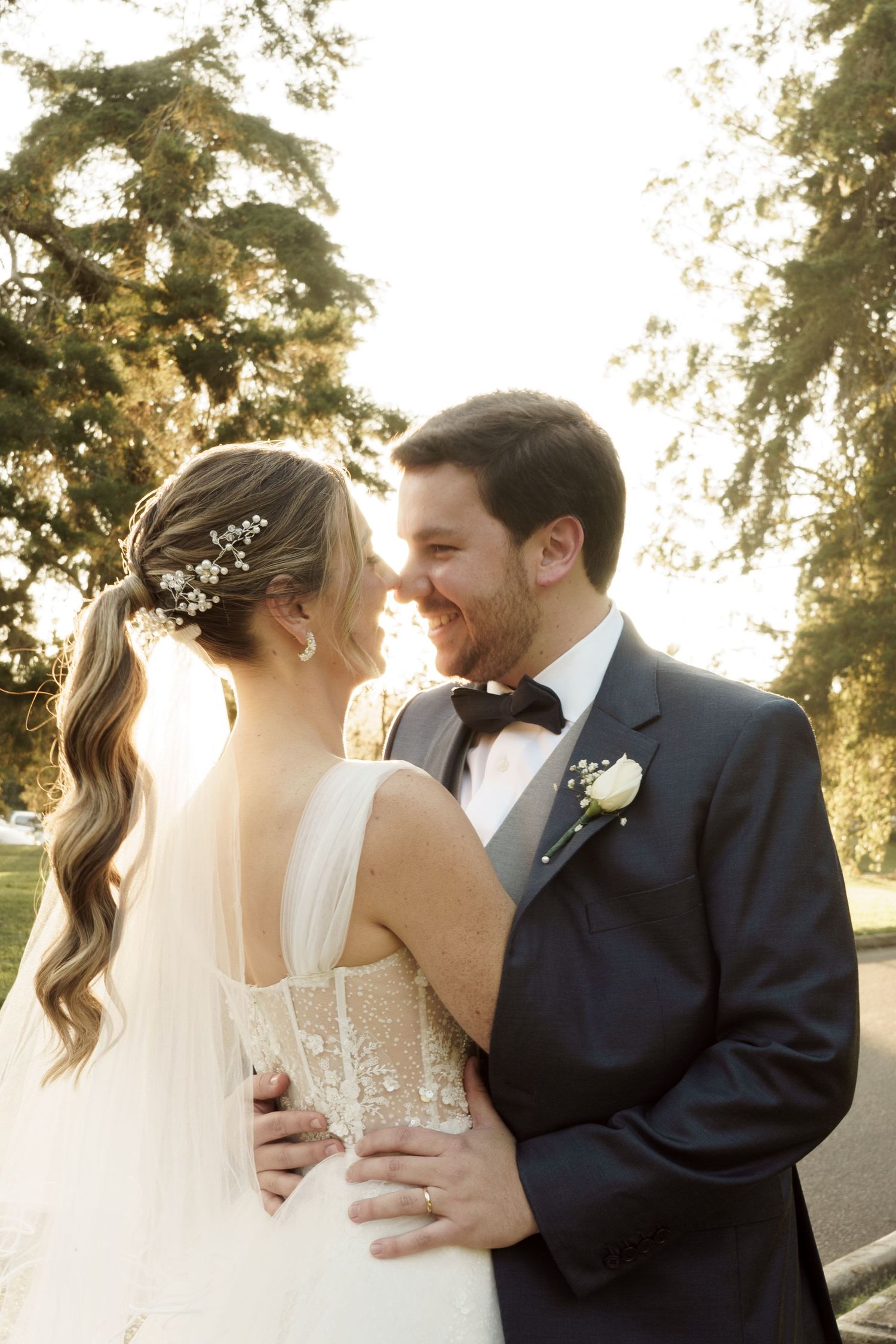 Intimate couple’s portrait surrounded by nature—perfect for outdoor wedding inspiration.