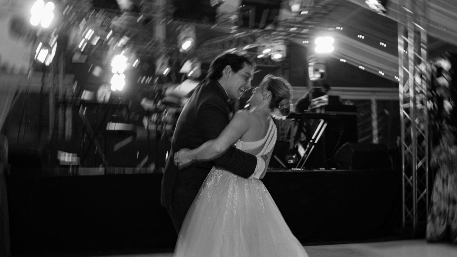 Laughter and movement captured during a joyful destination wedding party.