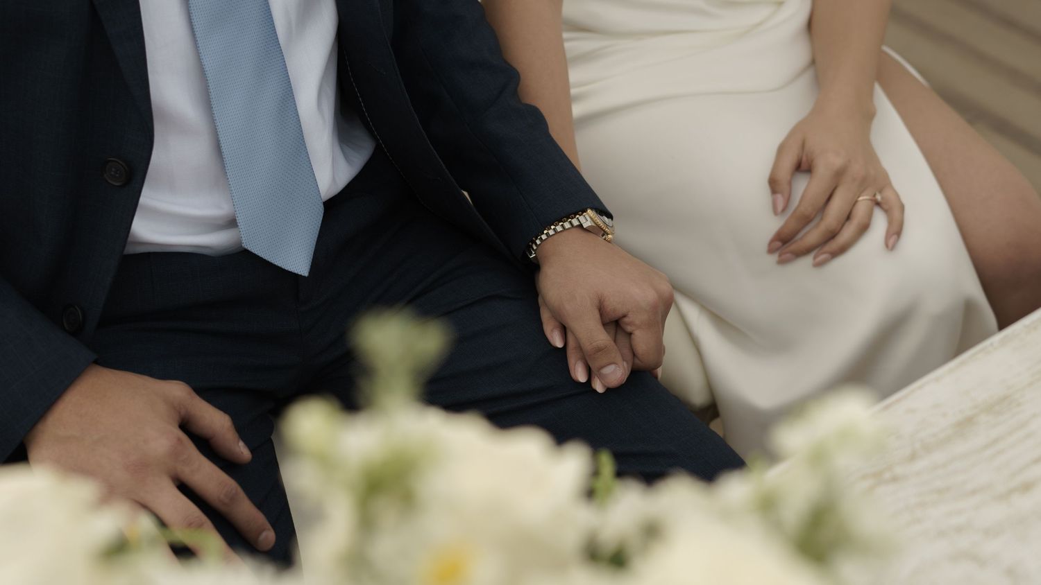 Romantic wedding couple captured in soft natural light with an elegant, refined look.