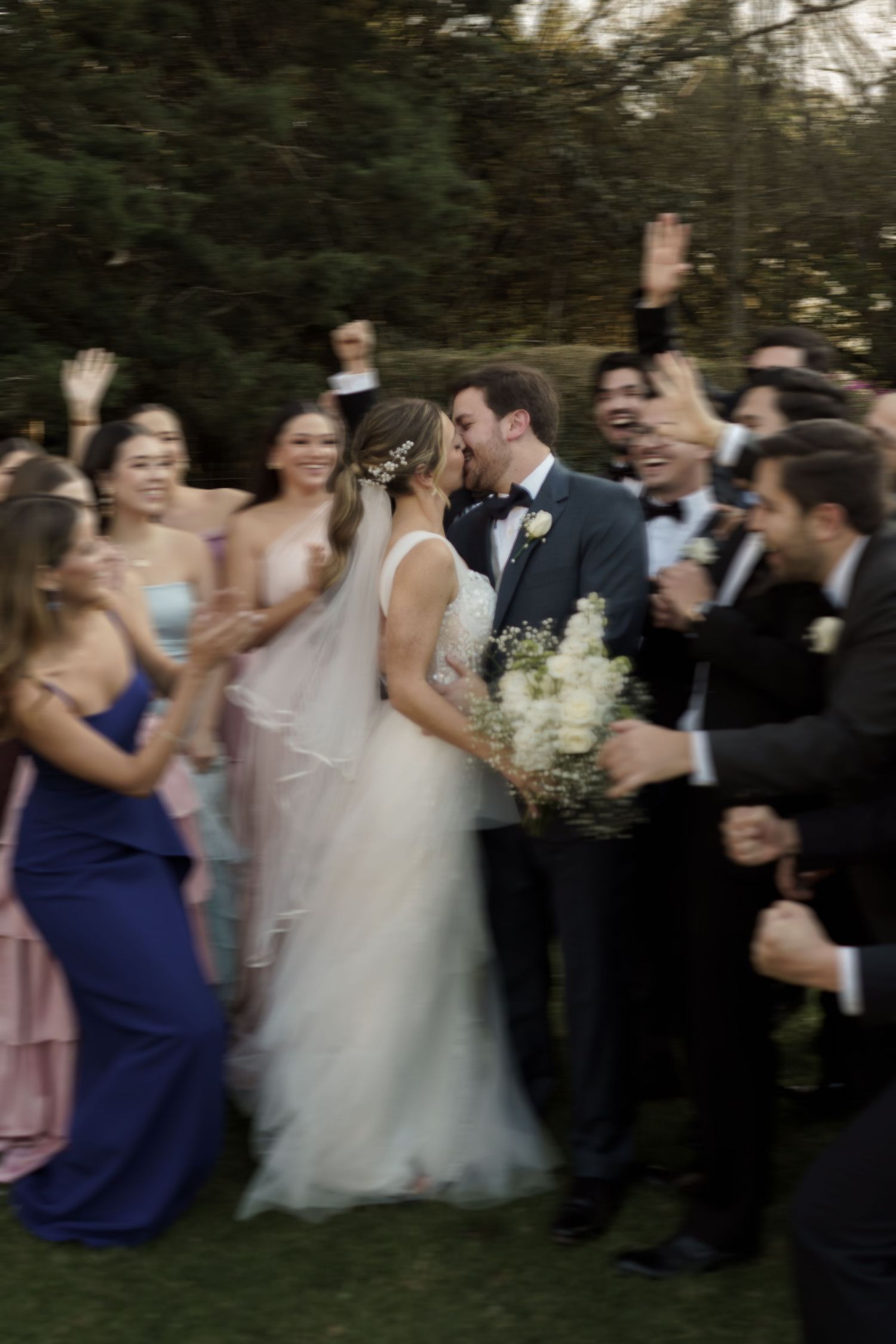 Romantic wedding couple captured in soft natural light with an elegant, refined look.
