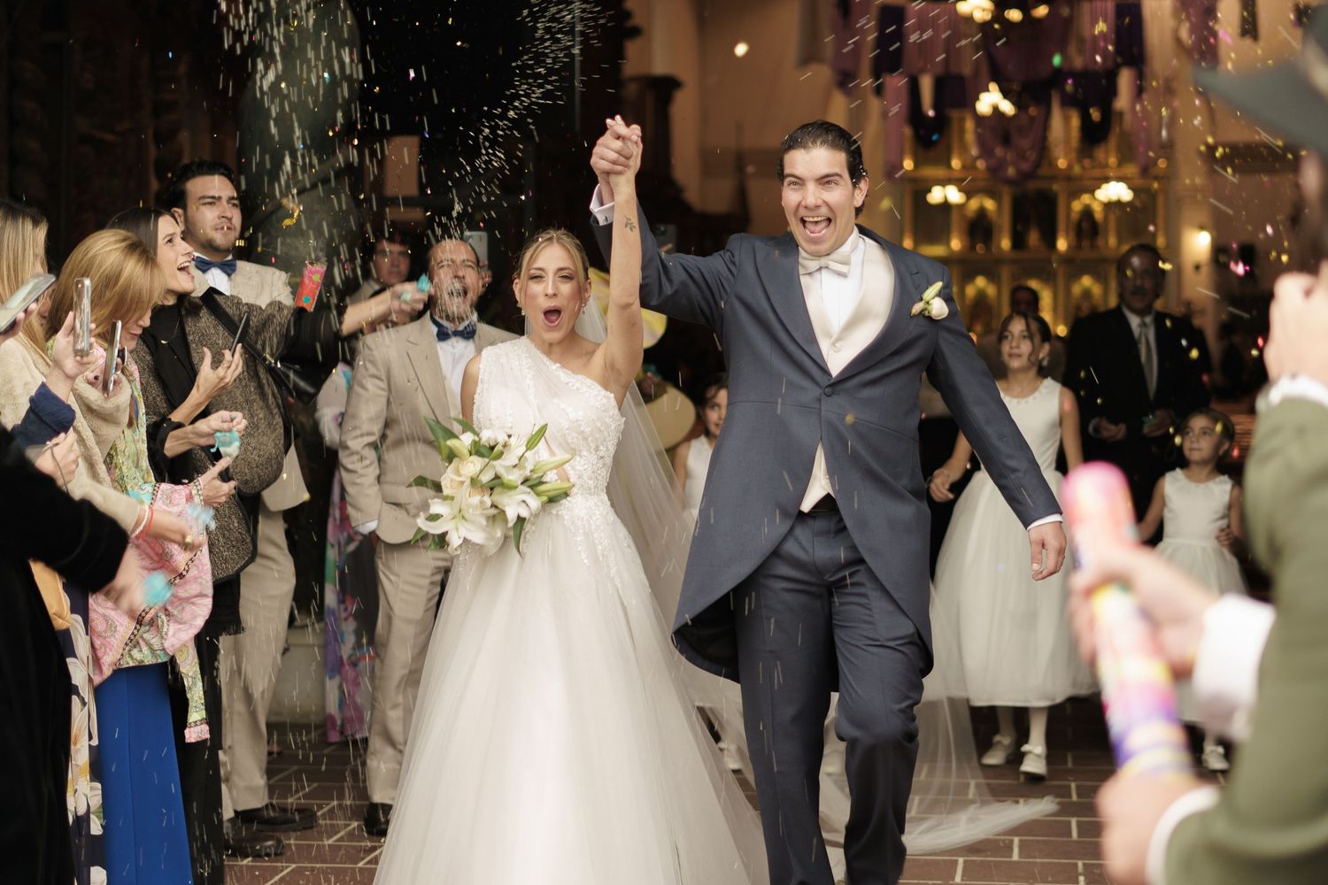 Laughter and movement captured during a joyful destination wedding party.