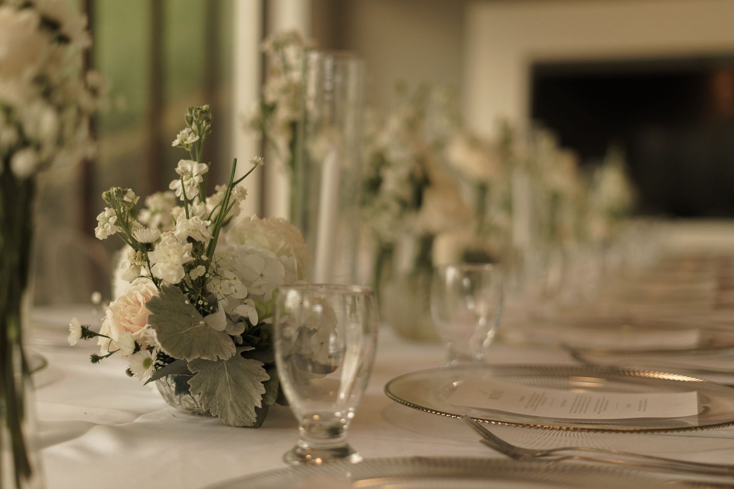 Elegant wedding tablescape inspiration with curated floral details and candlelight.