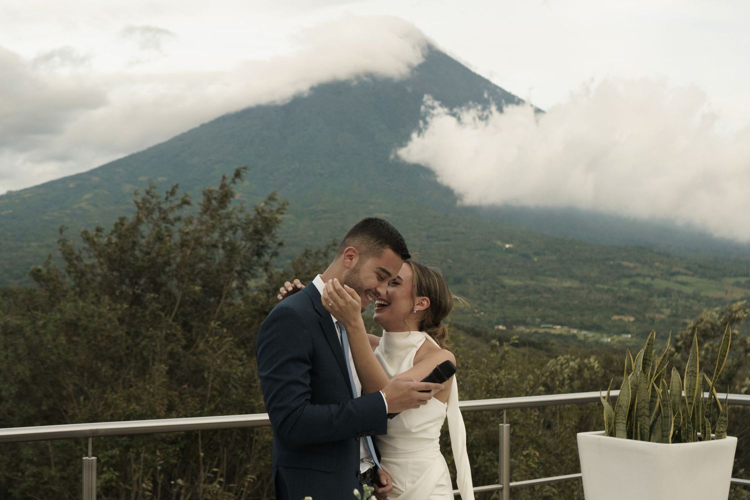 Romantic wedding couple captured in soft natural light with an elegant, refined look.