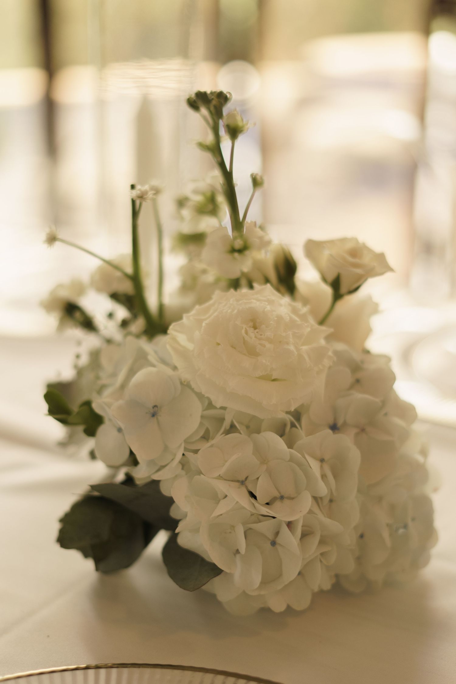 Elegant wedding tablescape inspiration with curated floral details and candlelight.
