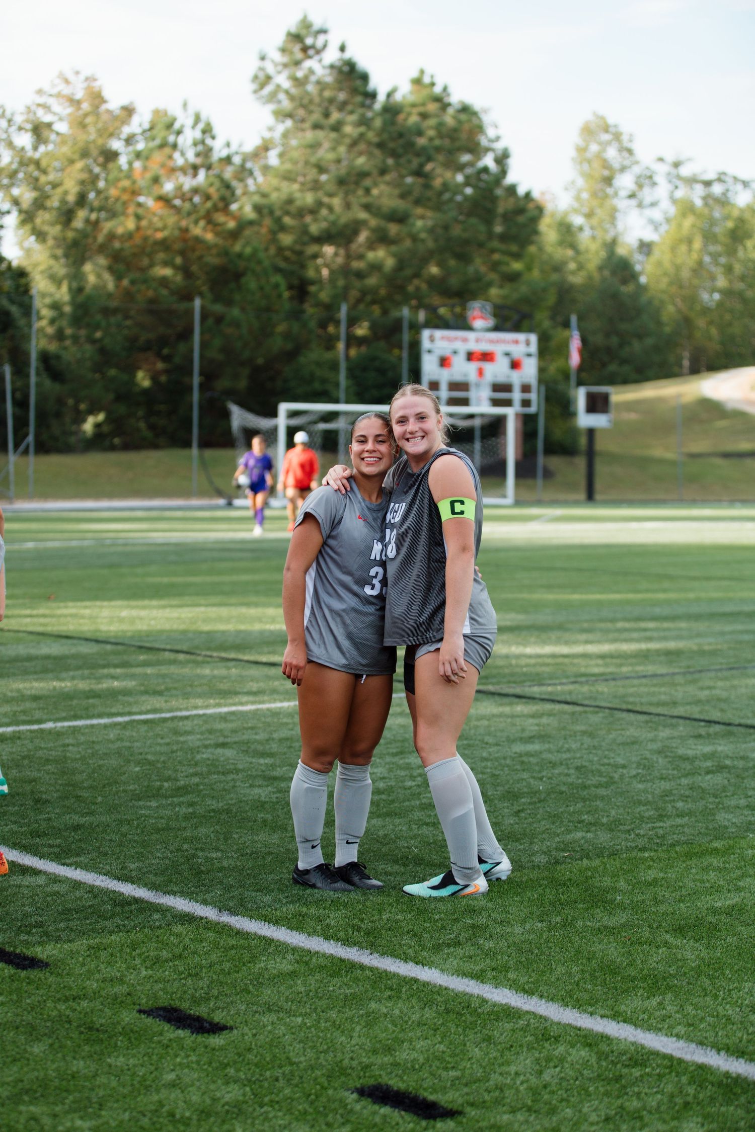 Soccer players posing for group picture