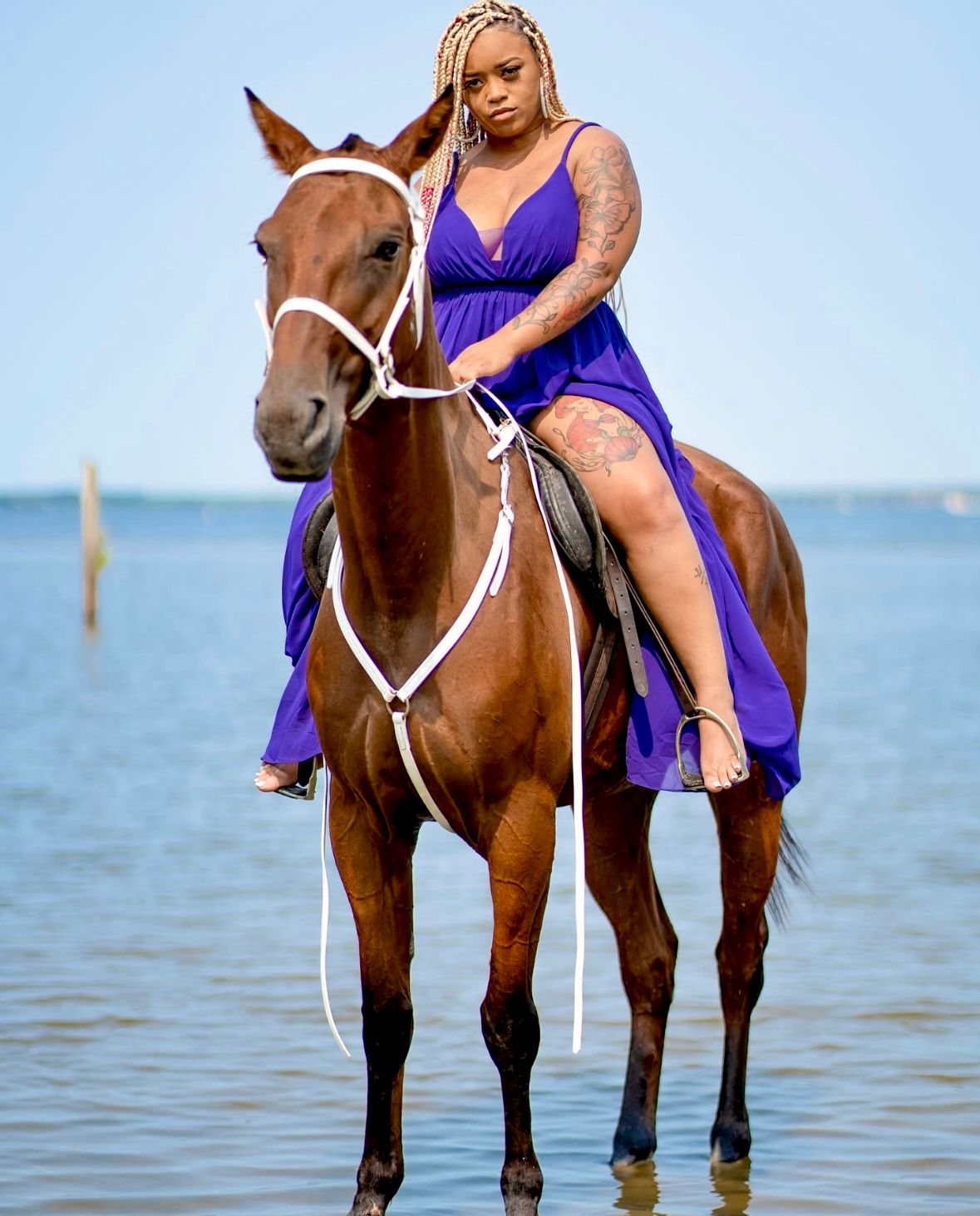 Creative birthday shoot on horse in lake downtown Austin, Tx.