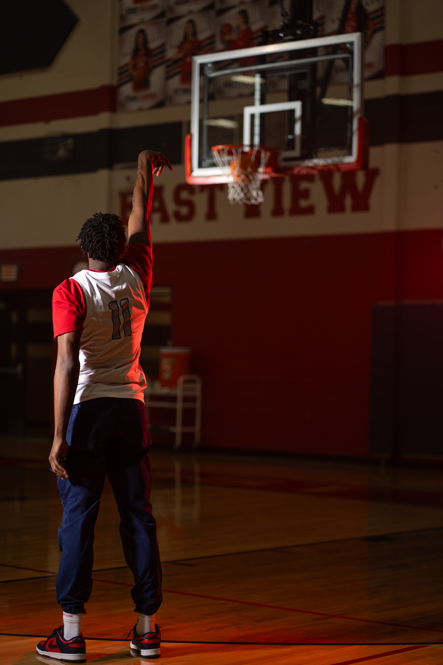 High school athlete posing to show off his basketball skills in Austin, Tx.