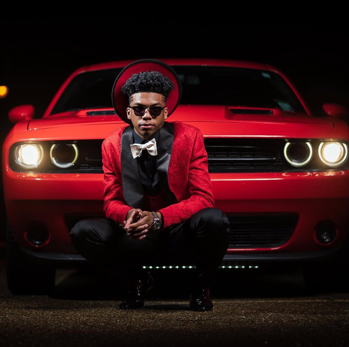 Solo prom photos with a luxury car taken in downtown Austin, Tx.