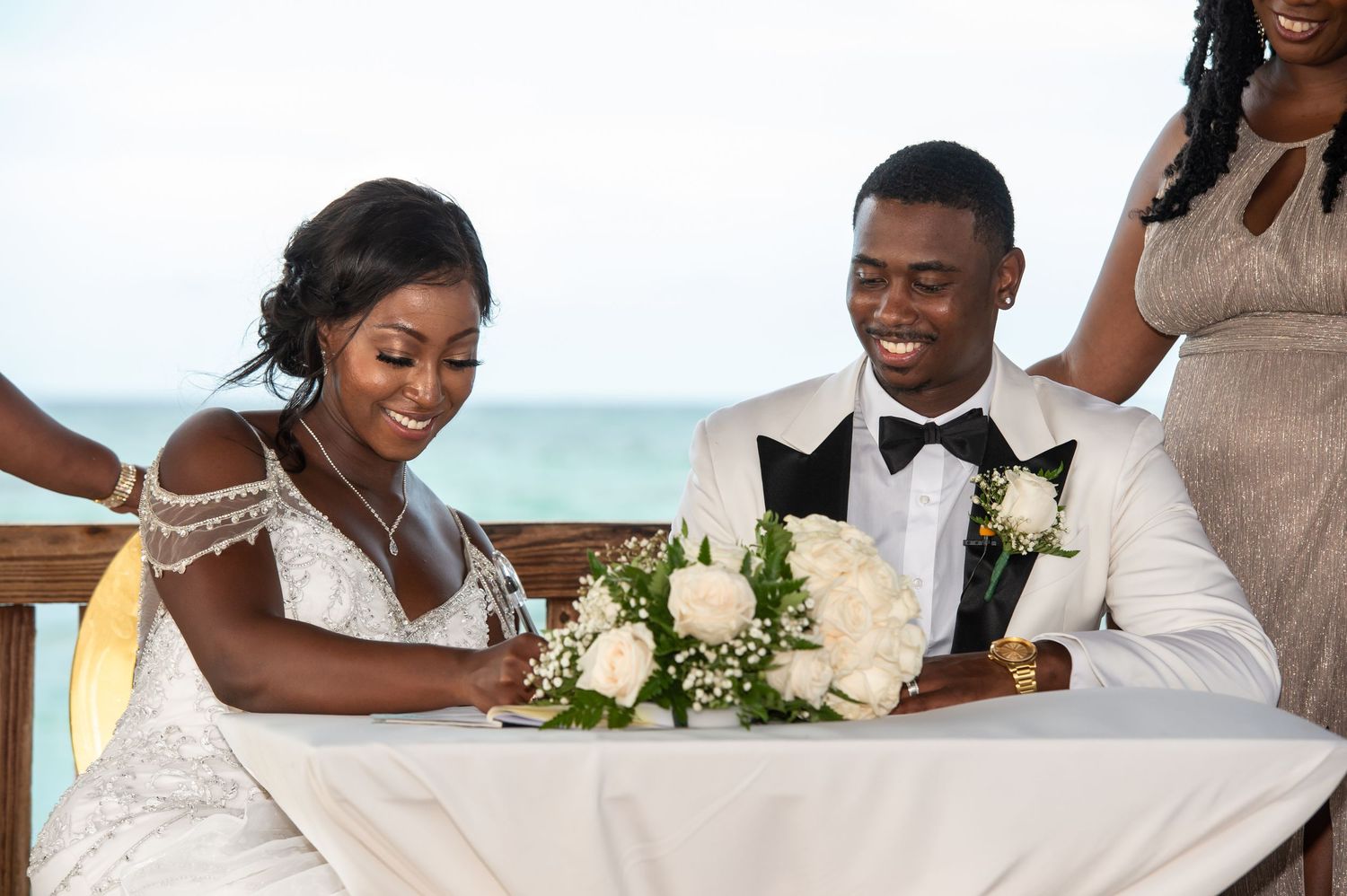A joyful wedding celebration scene with dancing and embraces captured in a collection of photo moments.