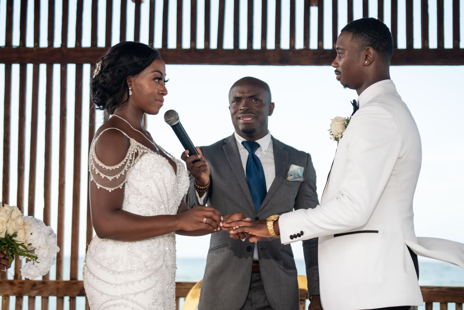 Collage of romantic wedding candid photos showing couples at a beach ceremony venue.