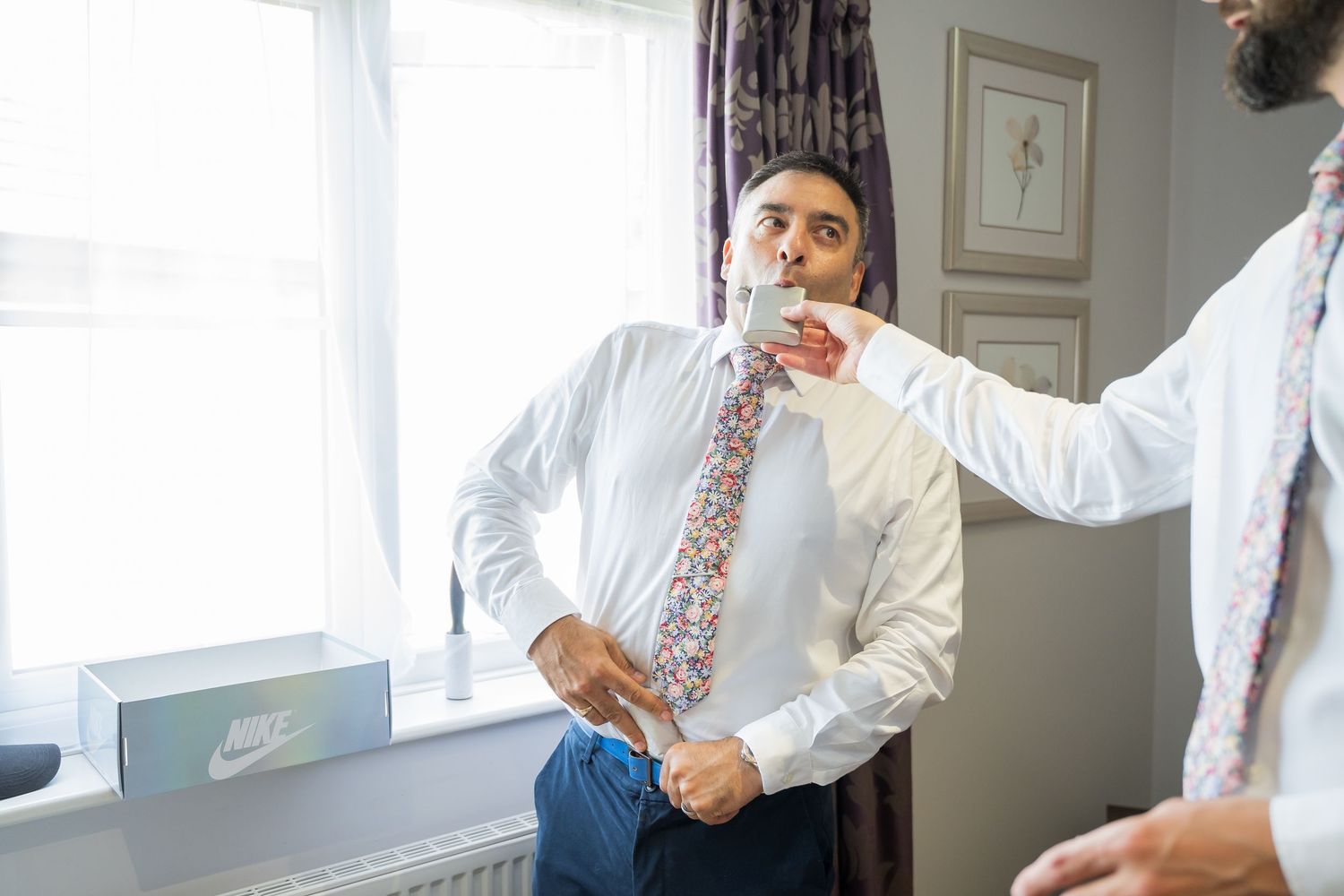 Groom getting ready at Burntwood Court Hotel in Barnsley