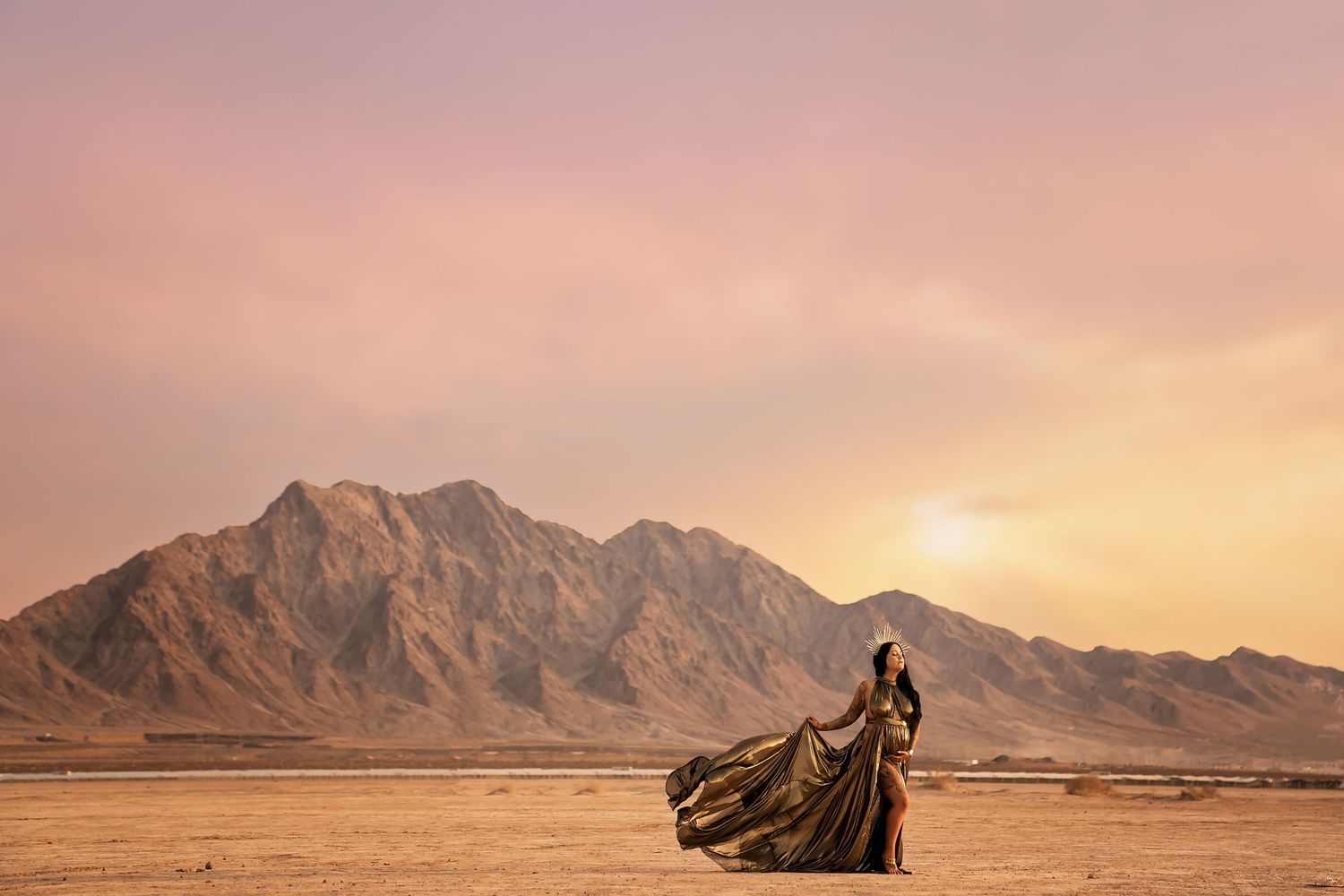 Las Vegas Maternity Session Desert landscape with dramatic mountain silhouettes at golden hour.