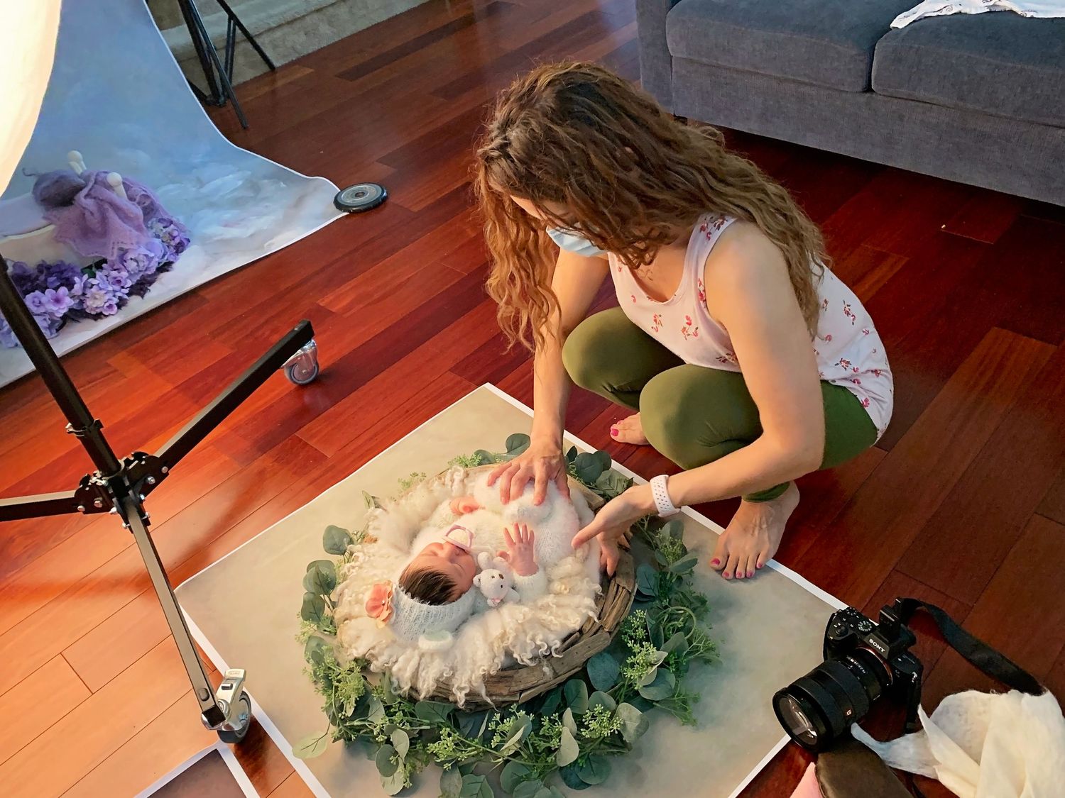San Diego Photographer posing newborn baby in studio