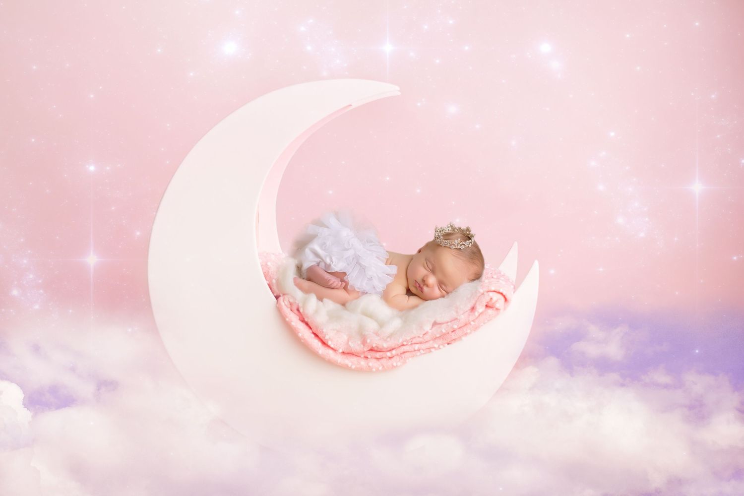 Dreamy pink celestial backdrop with crescent moon shapes and sparkles. San Diego Newborn Photographer