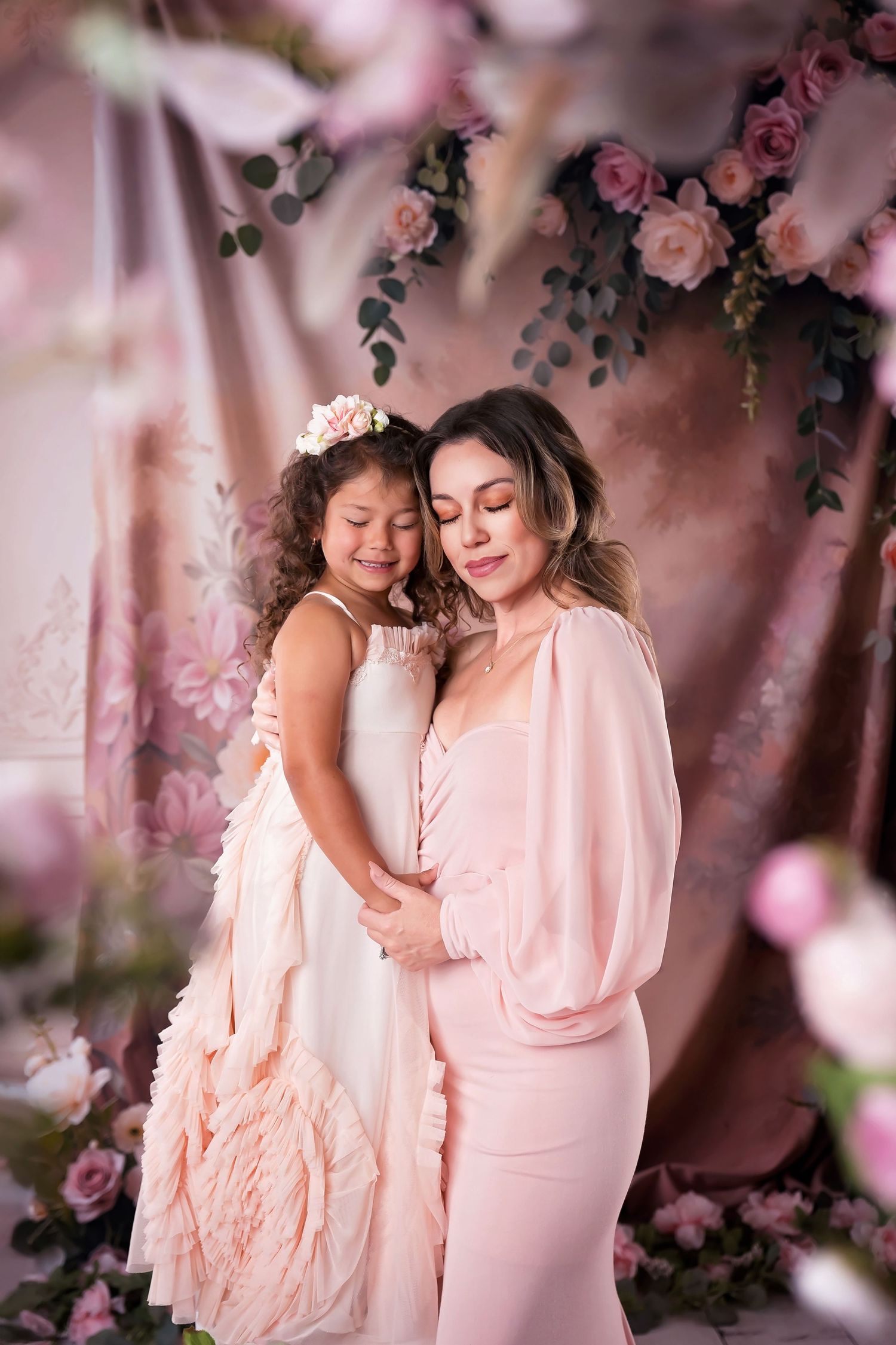 Mother holding baby during Mother’s Day photos in Chula Vista studio