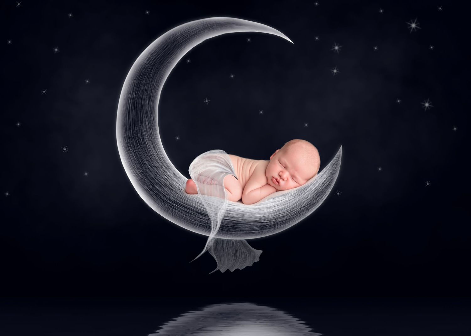 Creative newborn photography with baby sleeping on crescent moon prop against starry background. San Diego Newborn Photographer
