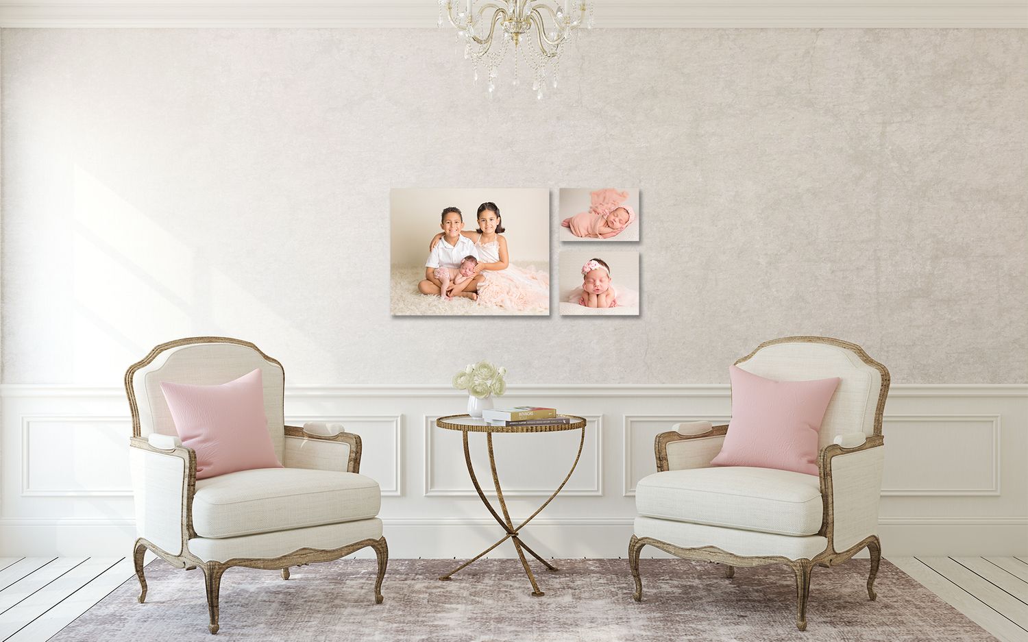 San Diego newborn photographer Two elegant cream-colored French provincial style chairs with pink accents sit against a white textured wall.