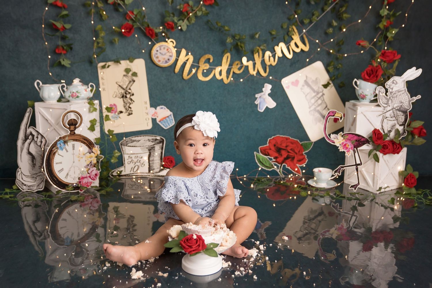 Onderland theme cake smash session with Alice and vintage decorations. San Diego Cake Smash Photographer