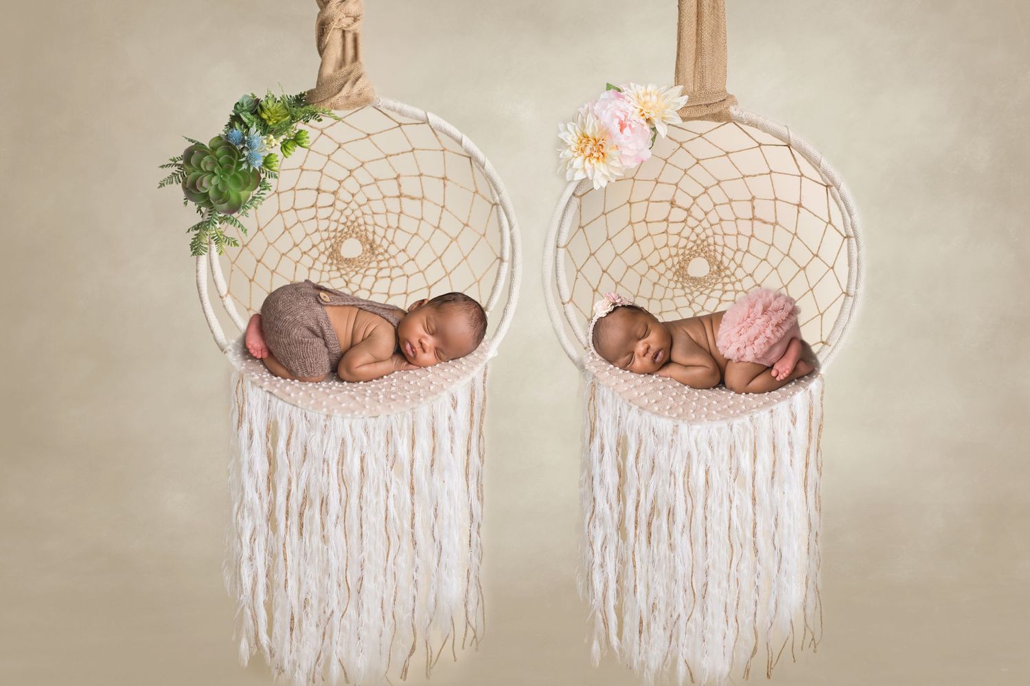 San Diego newborn photographer captures Artistic dreamcatcher props arranged for newborn twins photography.