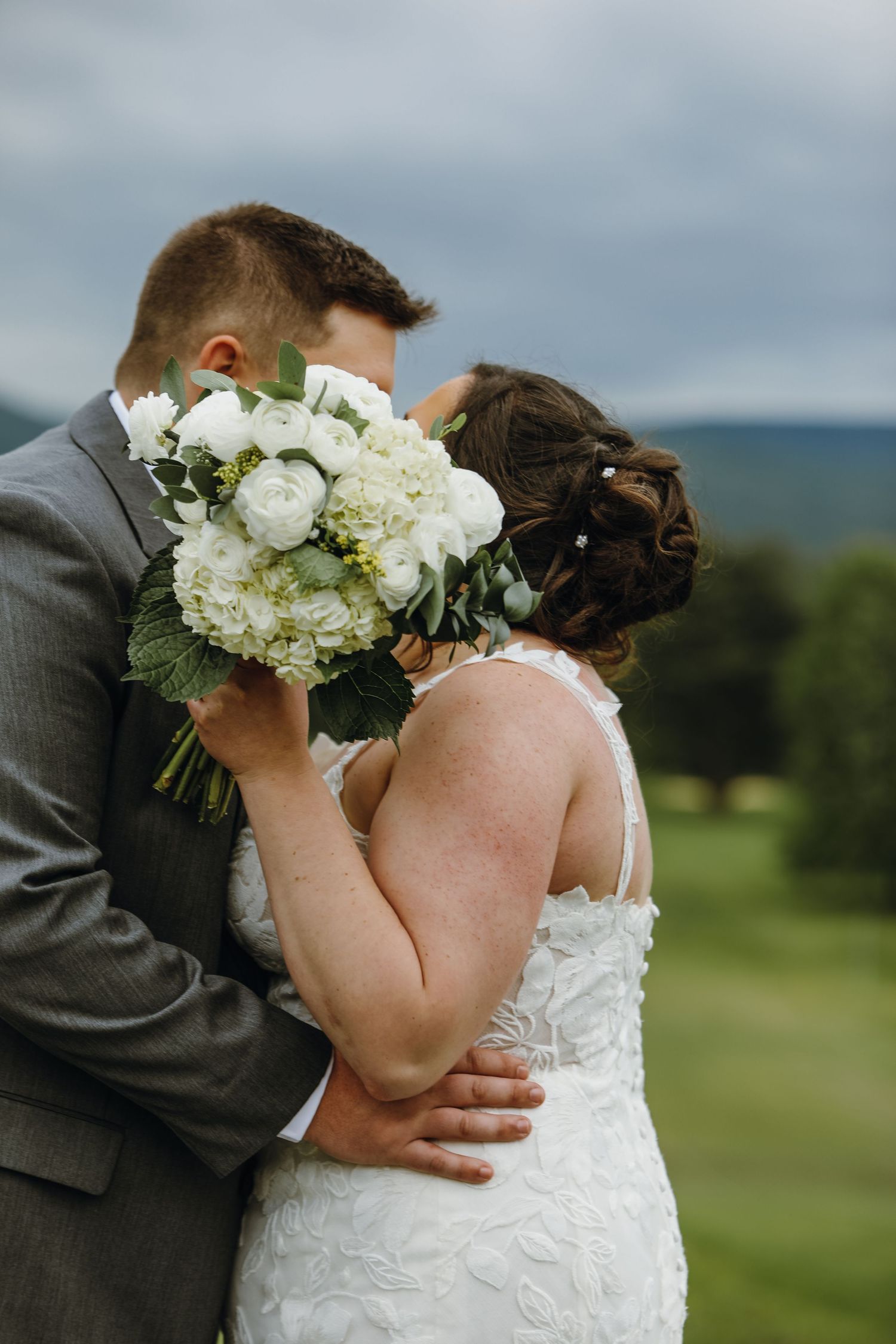hidden faces after a wedding ceremony before reception photos