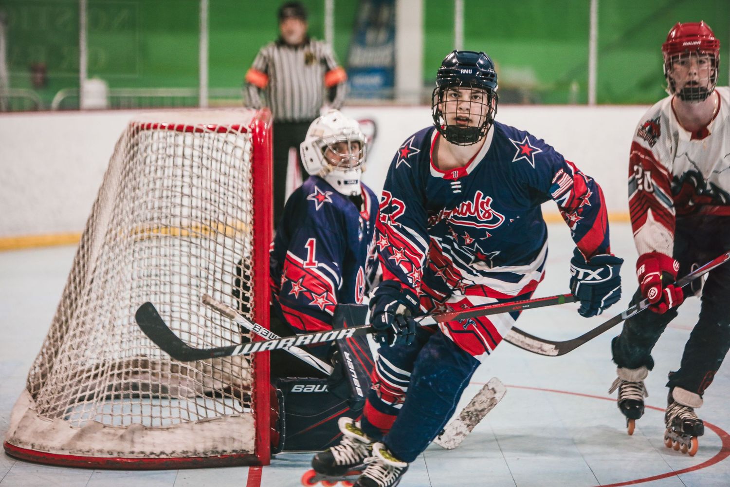 Robert Morris University roller hockey player after scoring goal