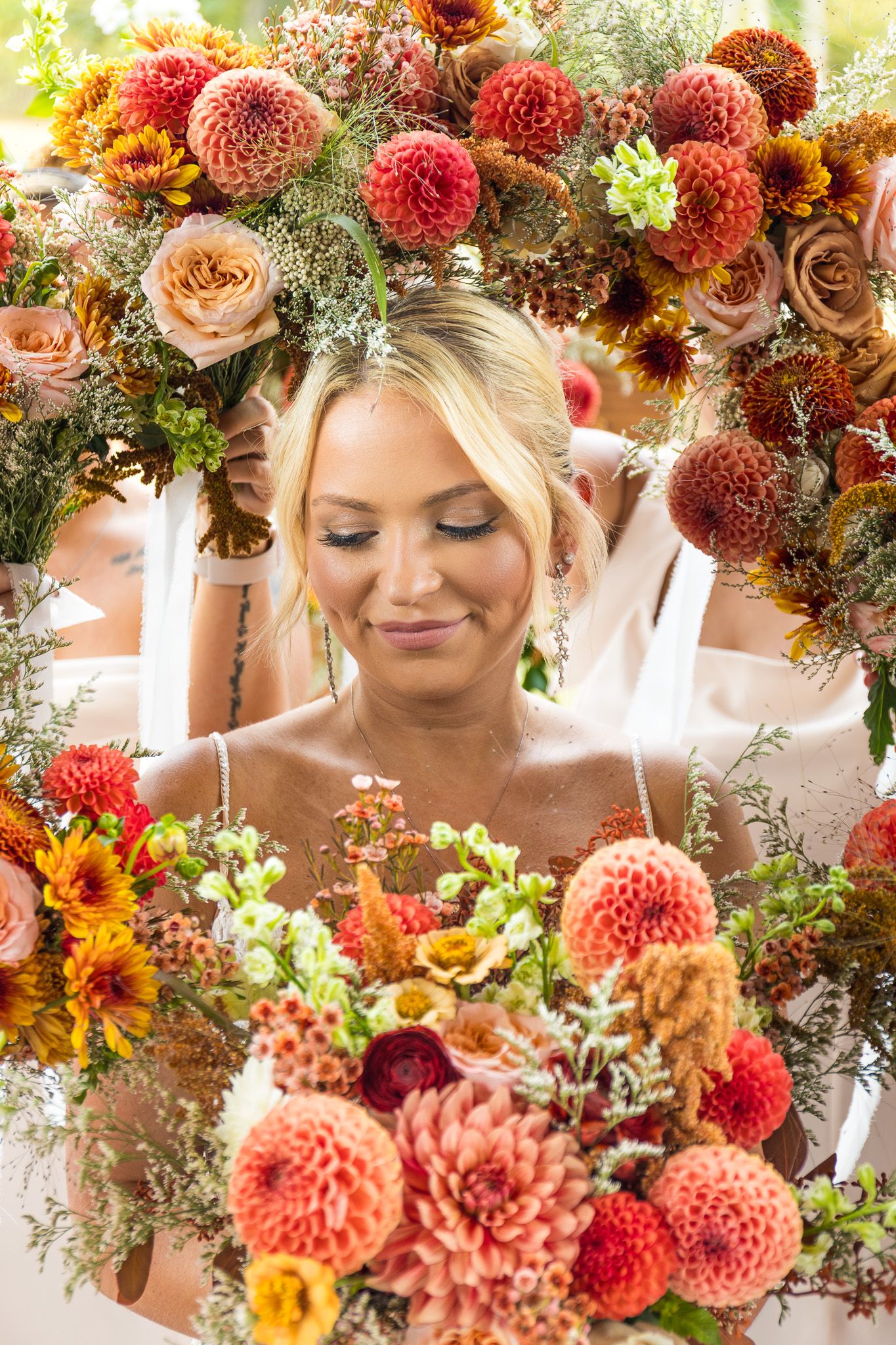 bride surrounded by beautiful flowers