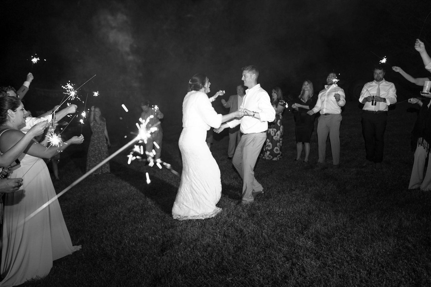 Black and white photo series showing couples dancing together at an outdoor nighttime event.