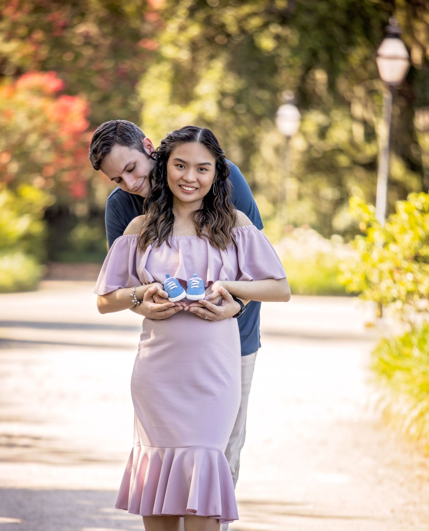 A couple shares intimate moments during an outdoor photo session in autumn scenery.