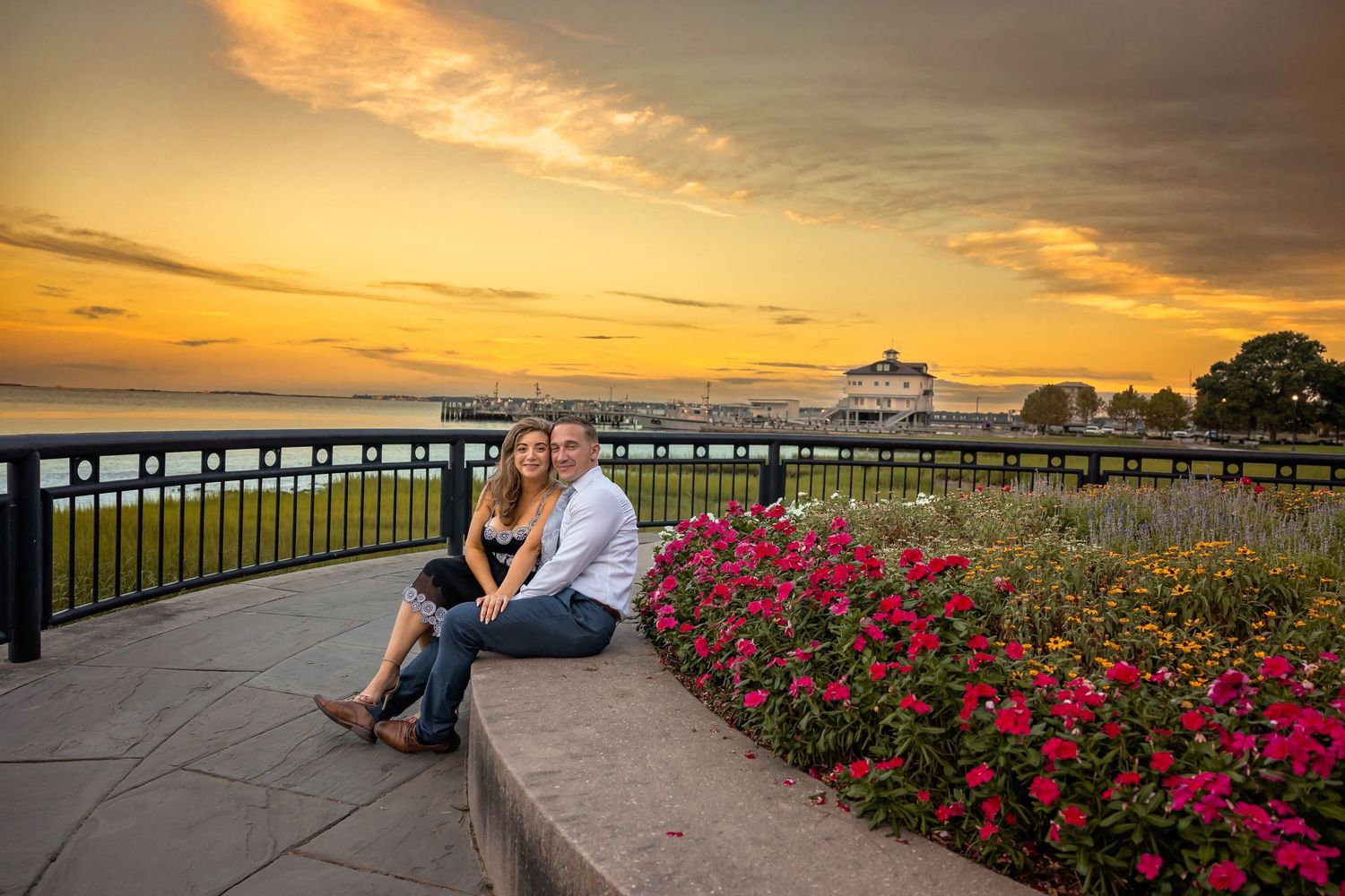 Romantic sunset proposal photos captured at Charleston waterfront park.