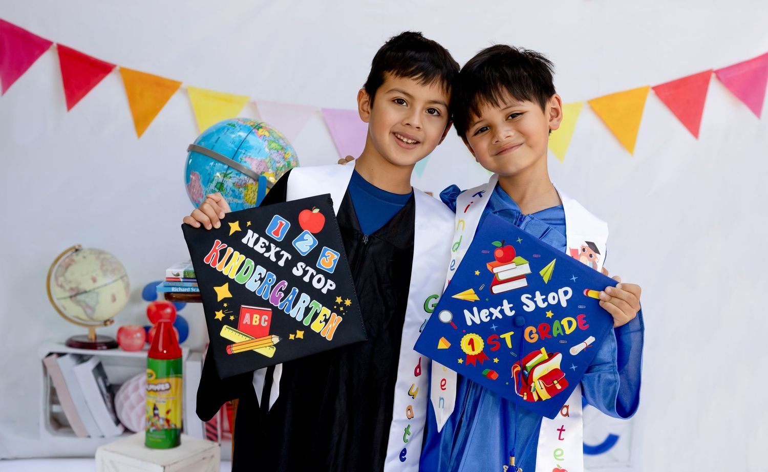 Cheerful graduation celebration with colorful pennants and school-themed decorations.