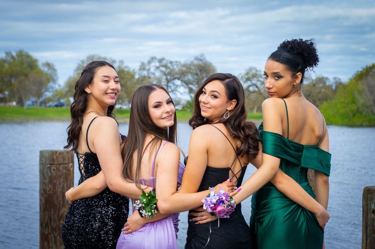 Group photo showing people embracing and laughing.
