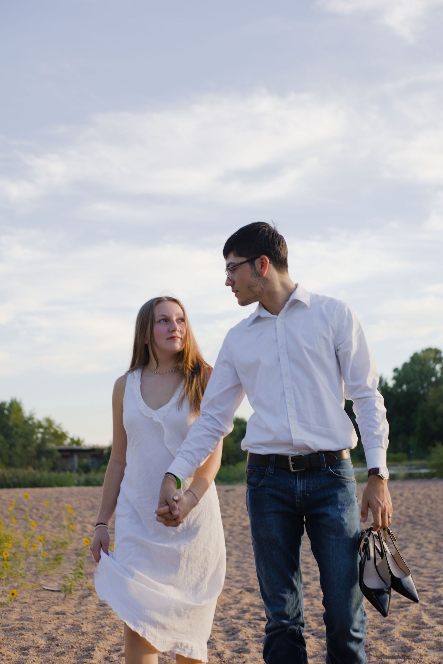 Natural light couples photos Hutchinson KS photographer, offering bright, airy, romantic portraits filled with genuine emotion and love.
