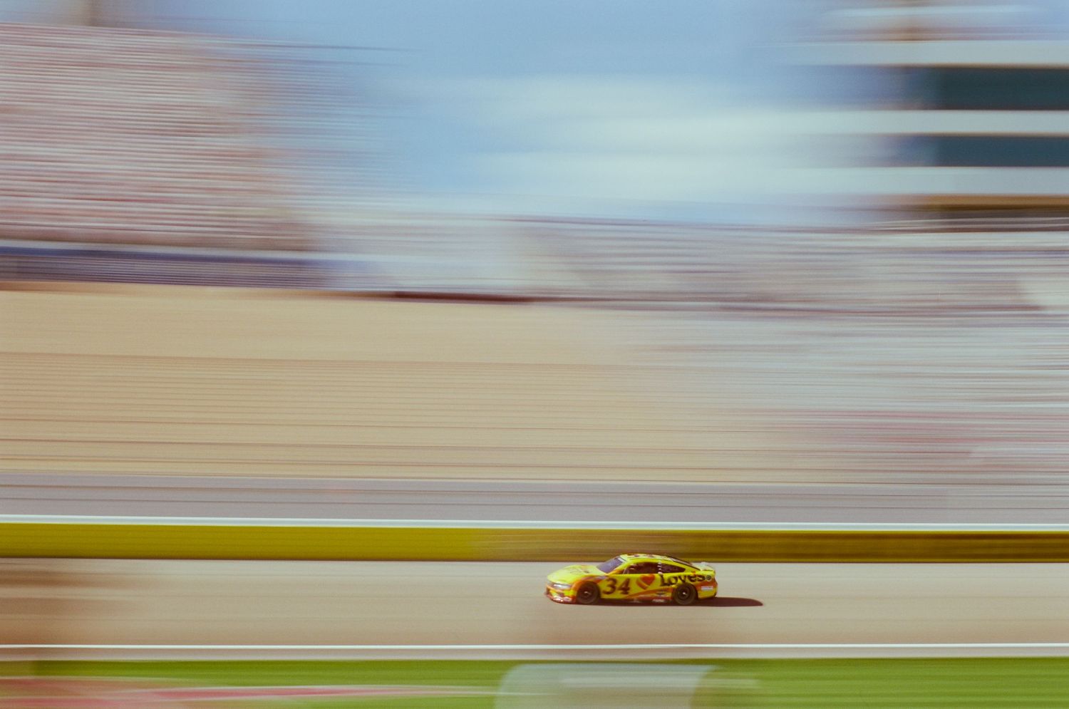 A 35mm film photo from a NASCAR race at Las Vegas Motor Speedway in 2024.