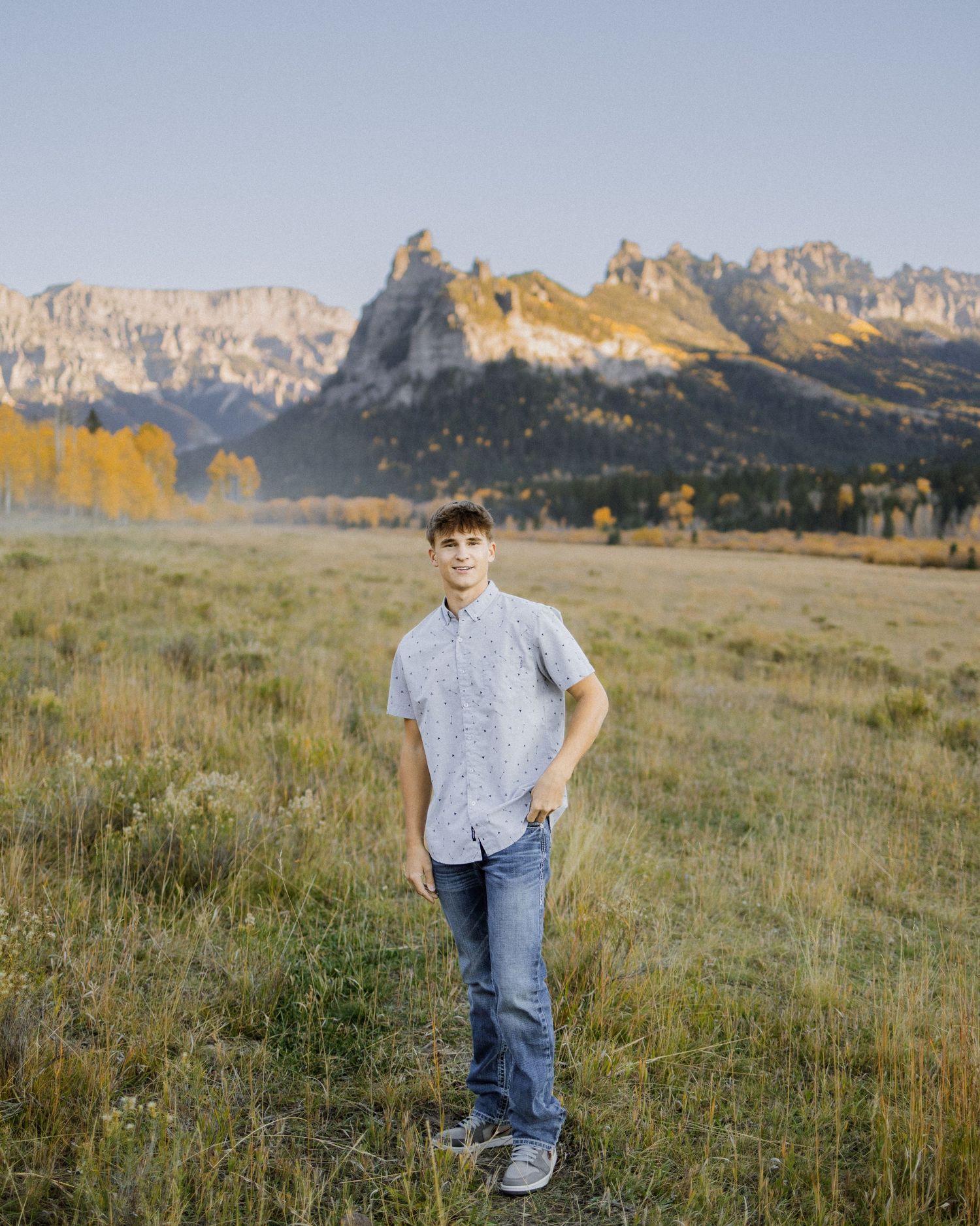 Senior photo in a wide mountain valley in Silver Jack, Colorado.