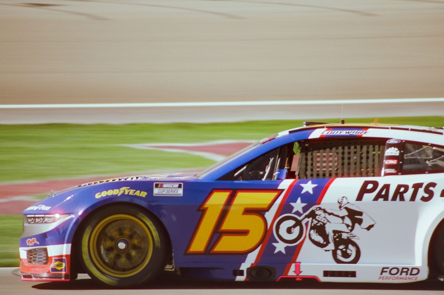 A 35mm film photo from a NASCAR race at Las Vegas Motor Speedway in 2024.