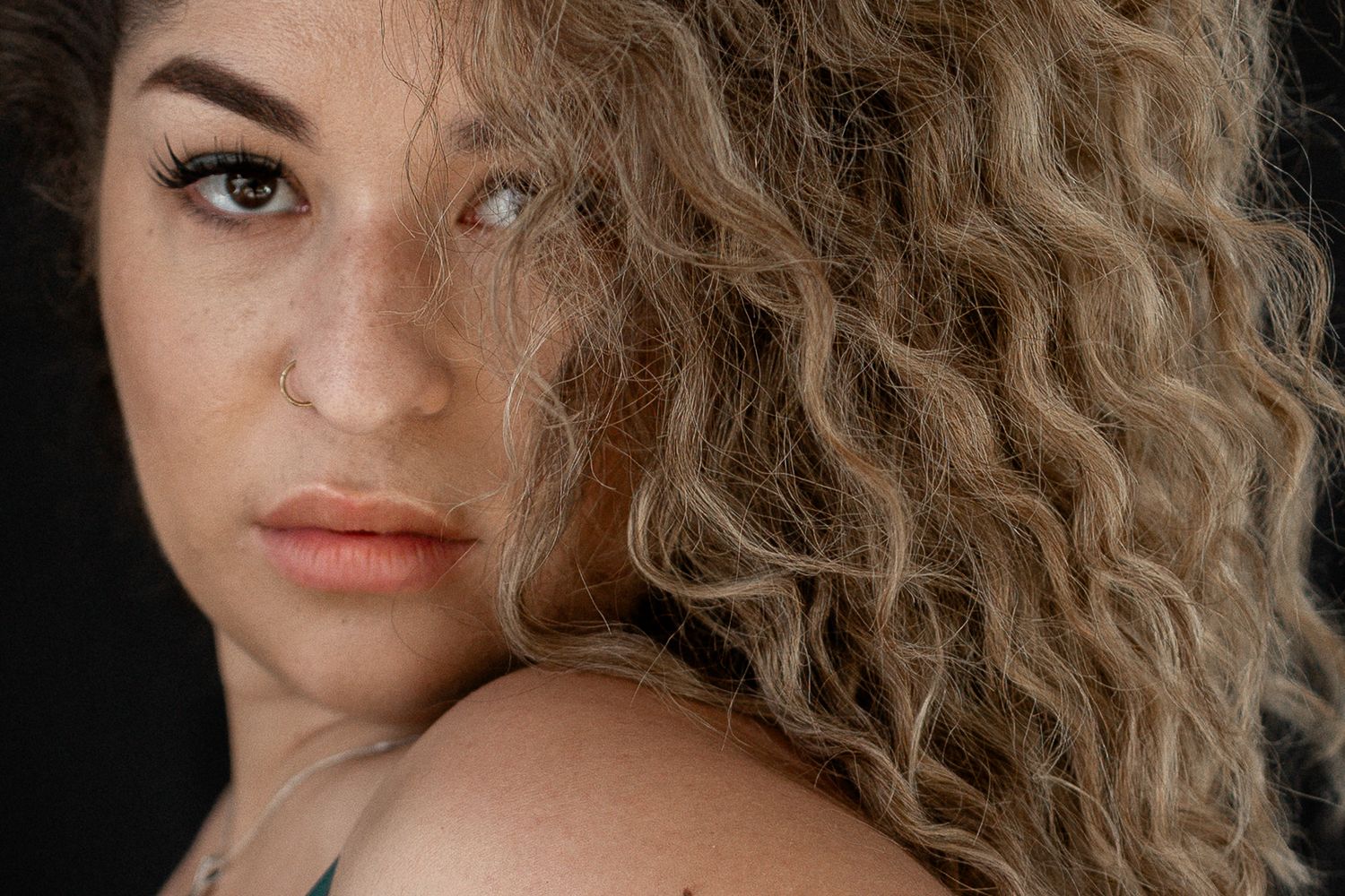 Close up portrait of woman sultry face during an body inclusive empowerment photoshoot at Untamed Muses in Thetford