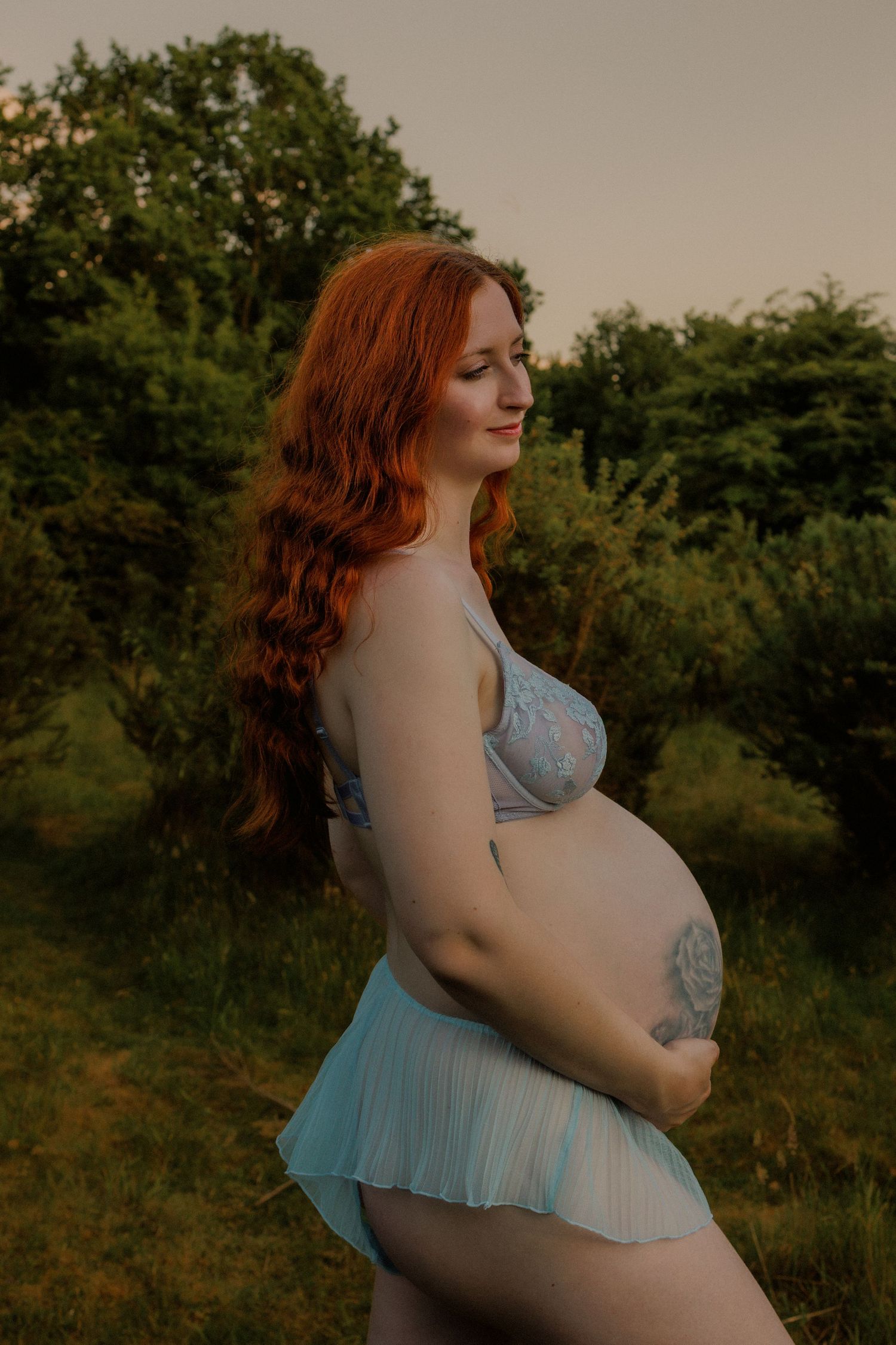 The woman beneath the bump, celebrating your essence during this transformative season. Maternity boudoir in nature, at our home studio