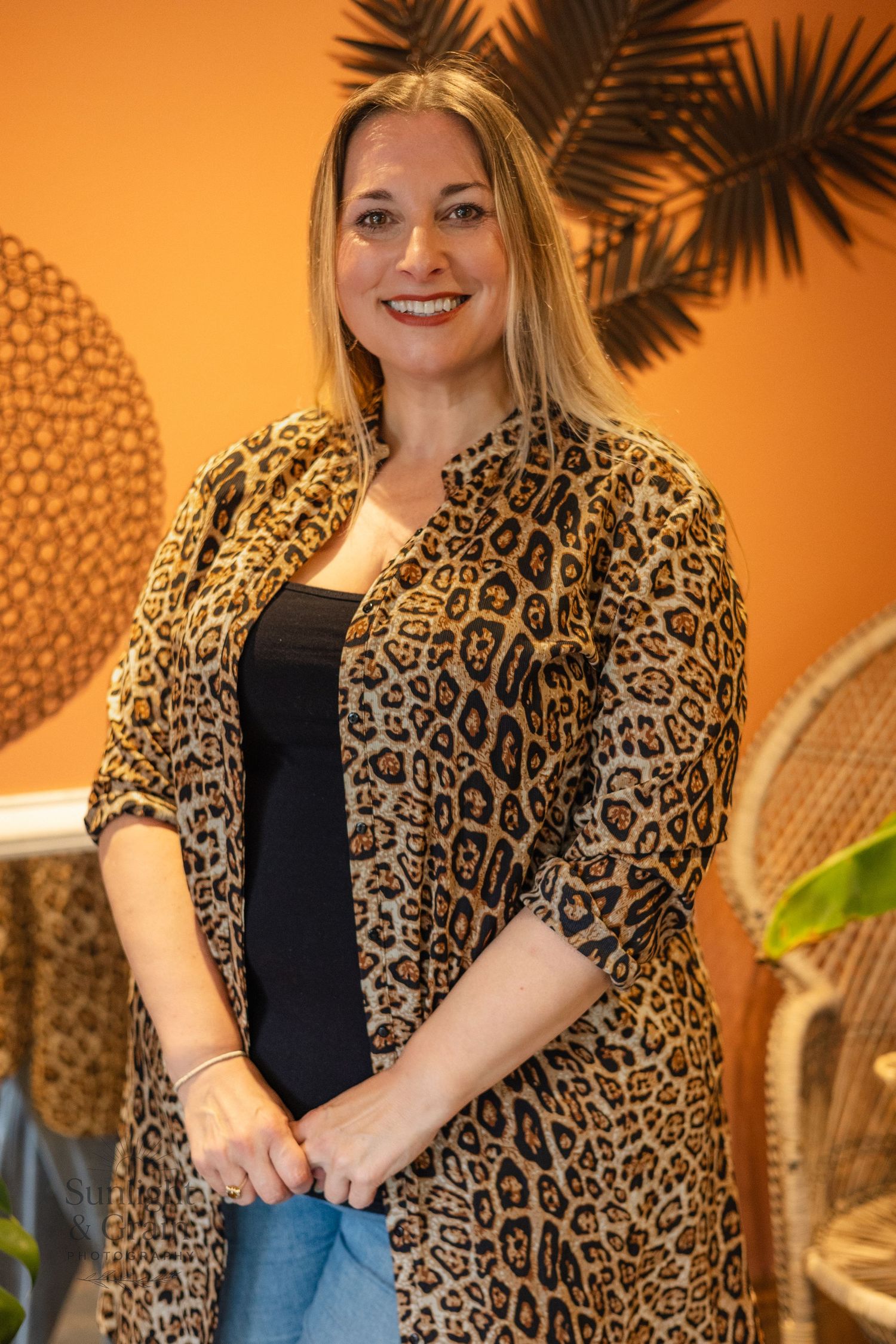 Portrait of a participant during a MIB Norwich event at SunFyr Barns, orange wall background