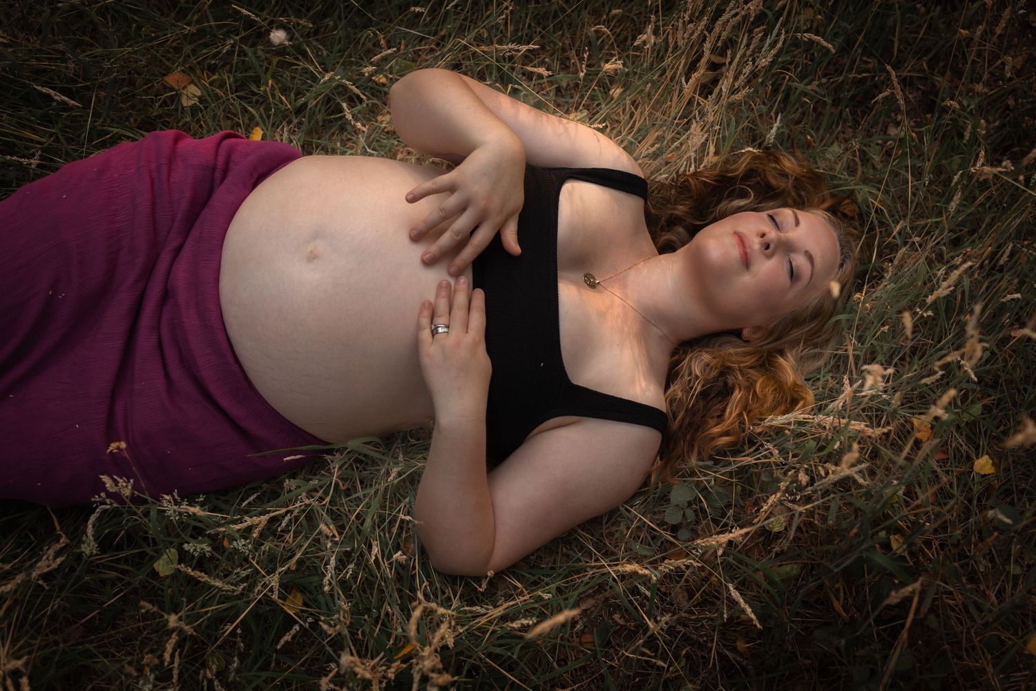 Soulful empowerment portrait in a Norfolk woodland, from a sensorial maternity photoshoot captured by the female gaze of Untamed Muses